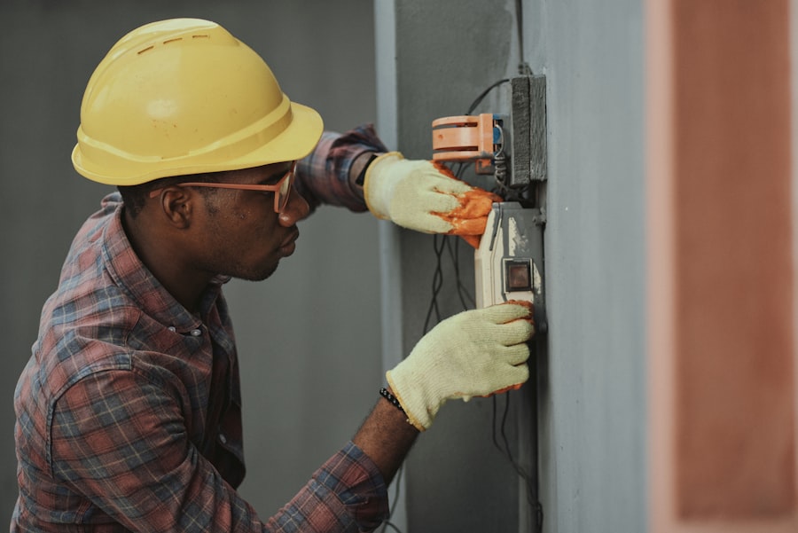 Electrician at a distribution board